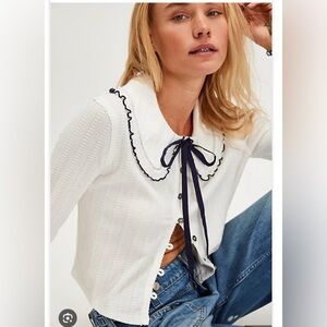 We the free Austin cardi